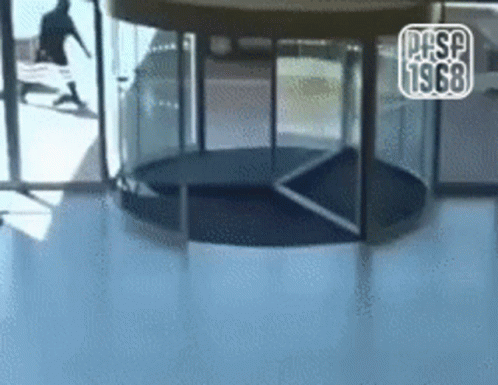 Revolving Door Funny Woman Fail GIF