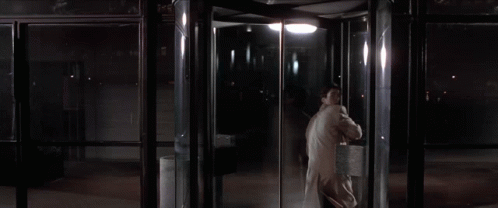 Revolving Door Patrick Bateman American Psycho GIF