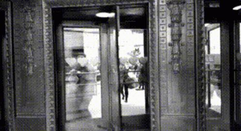 Revolving Door Spinning Classic Movie GIF