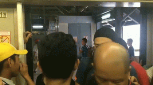 Revolving Door Train Full Crowd GIF