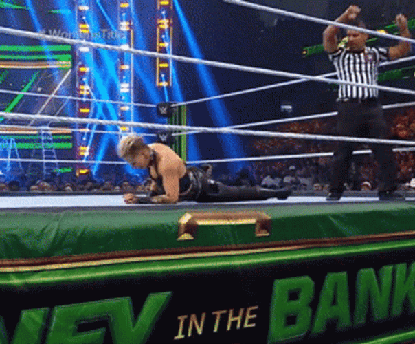 Rhea Ripley Bangs Head Against Wall GIF