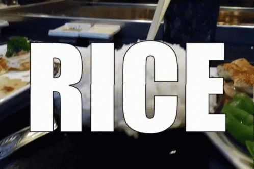 Rice Is Being Poured Into A Glass With Chopsticks GIF