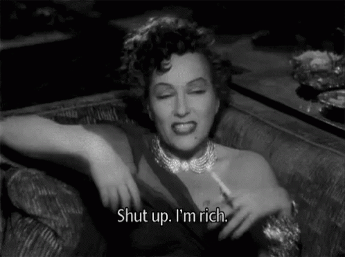 Rich Woman Holding Cigarette GIF