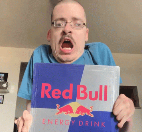 Ricky Berwick Showing Red Bull Sign GIF