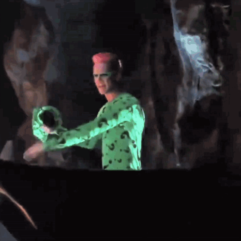 Riddler Holding His Mask GIF