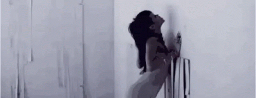 Rihanna Falling Down From The Wall GIF