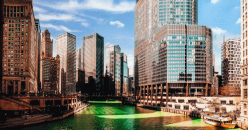 River in City With Building Saying Trump