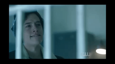 Riverdale Jughead Talking Behind Railings GIF