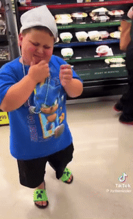 Rizzler Cute Chubby Kid Rubbing Chin GIF