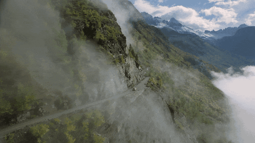 Road Up Mountain Covered in Clouds