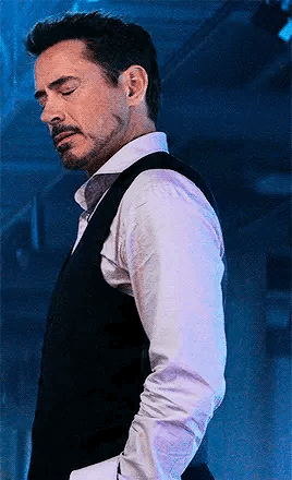 Robert Downey Jr. in White Shirt Black Vest and Tie