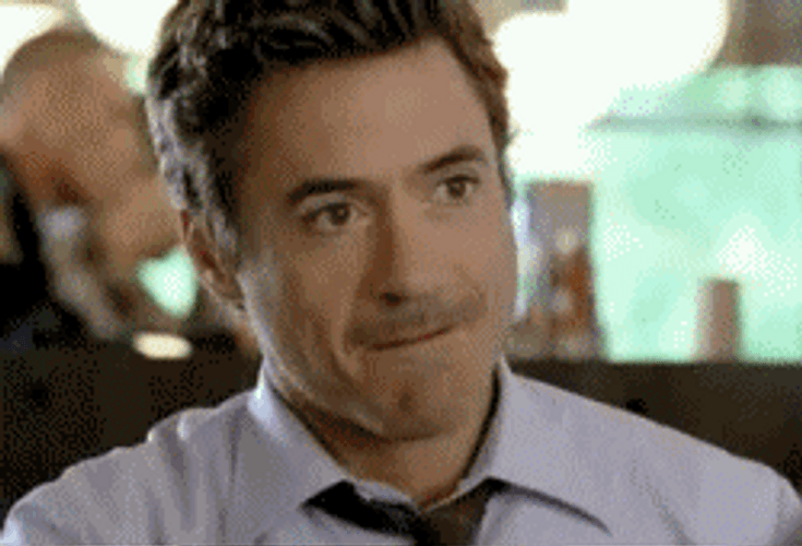 Robert Downey Trying Not To Laugh GIF
