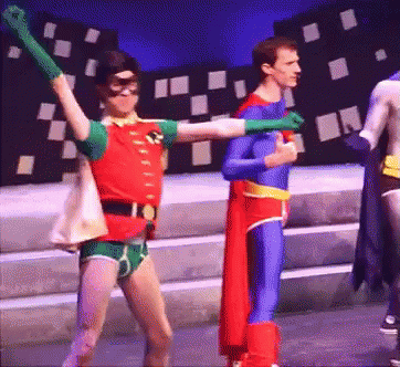 Robin and Superman Dancing on Stage