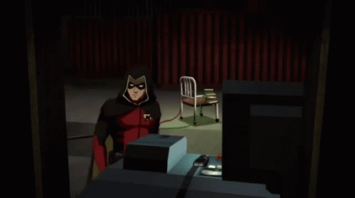 Robin Cartoon Character In Front Of Monitor GIF