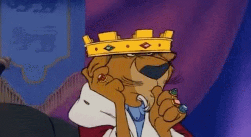 Robin Hood Is A Cartoon Character Wearing A Crown And Holding A Ring . GIF