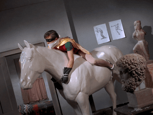 Robin Riding A Horse Sculpture GIF