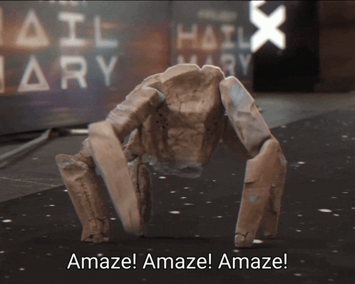 Robot Crawling Past Hail Mary Sign