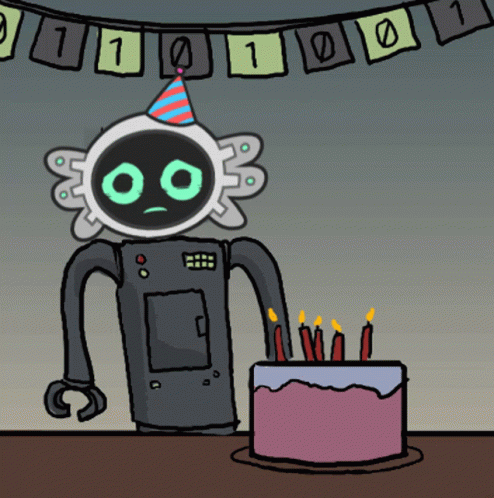 Robot Next to Cake With Candles
