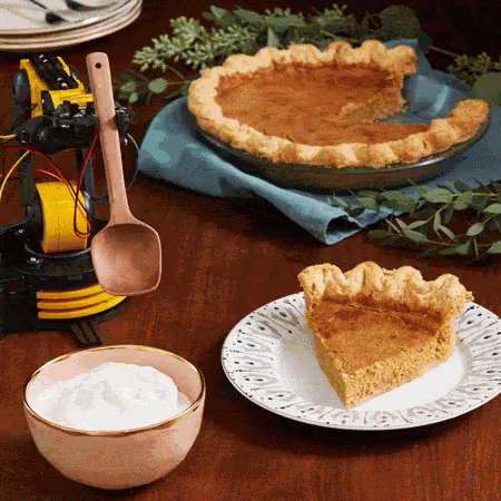 Robot Putting Whipped Cream On Cake GIF