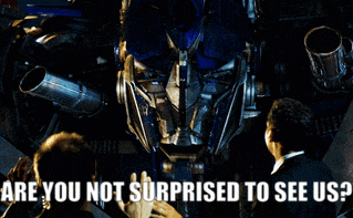 Robot Saying Are You Not Surprised To See Us GIF