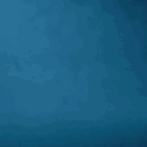 Robot Silhouette in Blue Water