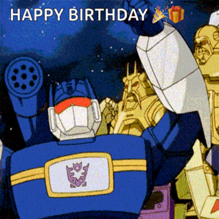 Robot Standing In Front Of Building With Legatron GIF
