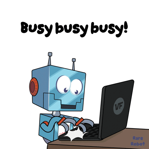Robot Using Laptop Saying Busy Busy Busy