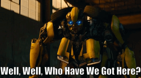 Robot with Blue Eyes Saying Well Well Who Have We Got Here