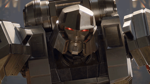 Robot With Red Eyes Saying Transformers
