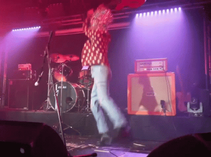 Rock Star Destroying Guitar GIF