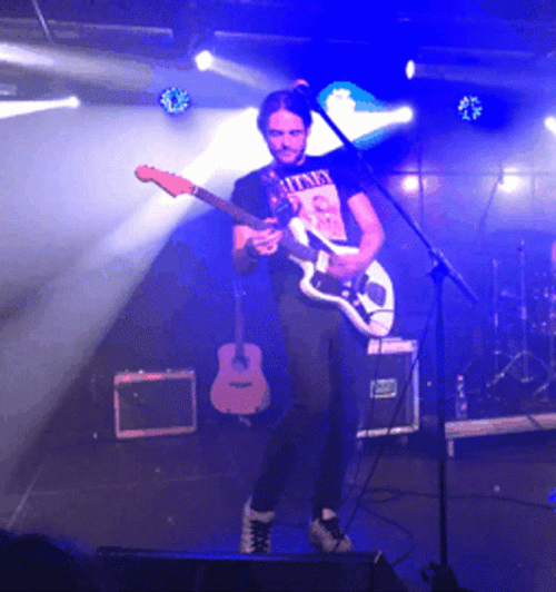 Rock Star Guitar Performance GIF