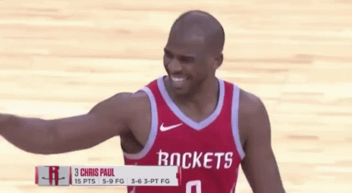 Rockets Basketball Player Smiling in Red Jersey