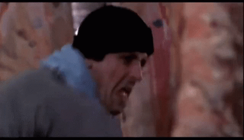 Rocky Balboa Training Punching Meat GIF