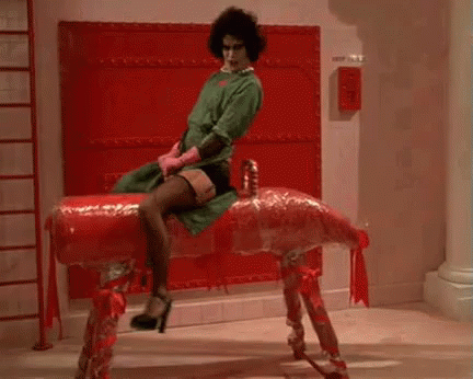 Rocky Horror Picture Show Meatloaf Riding Bull GIF