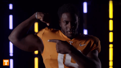 Rocky Top Football Player Flexing For Pose GIF