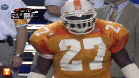 Rocky Top Player Entering Football Field And Pointing Up GIF