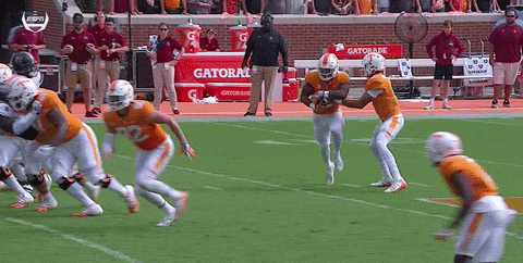 Rocky Top Player Running Through Opponents GIF