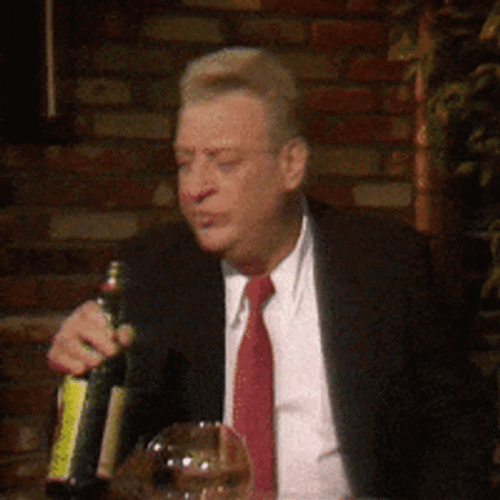 Rodney Dangerfield Chugs Wine GIF