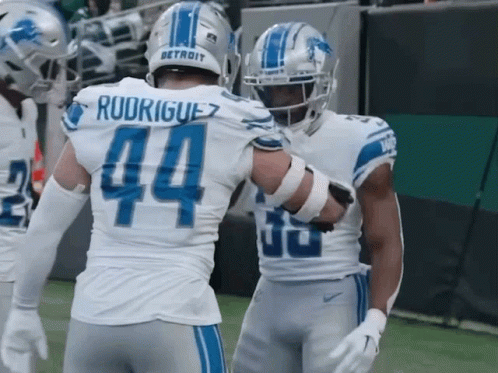 Rodriguez #44 Hugging Another Player GIF