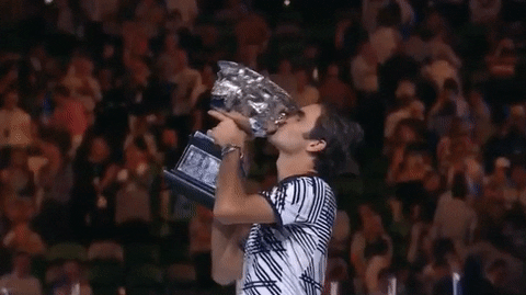 Roger Federer Kissing His Trophy GIF