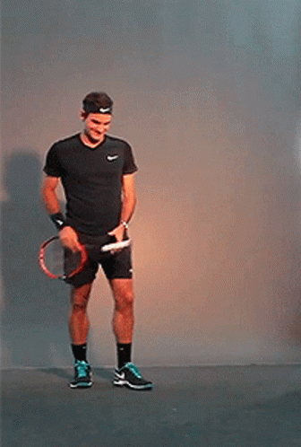 Roger Federer Using Racket As A Guitar GIF