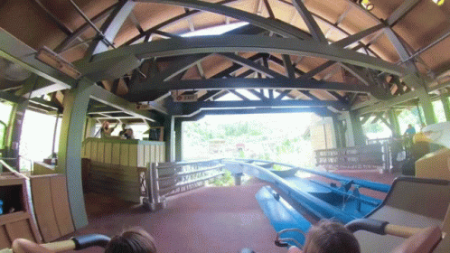 Roller Coaster Ride With Exit Sign