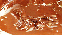 Rolling Chocolate Bites On Various Toppings GIF