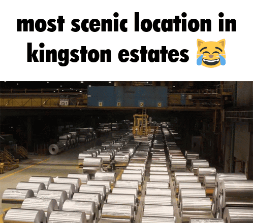 Rolls of Aluminum Lined Up in Factory
