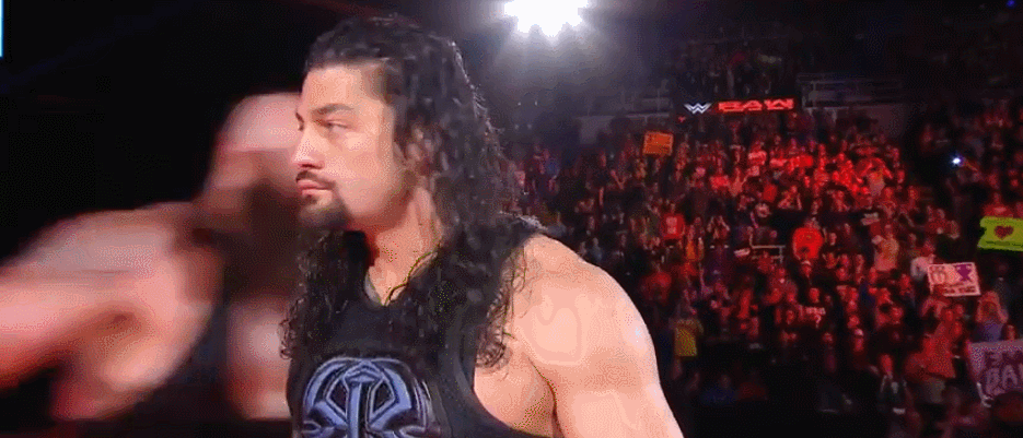 Roman Reigns Gets Smacked Falls Down GIF