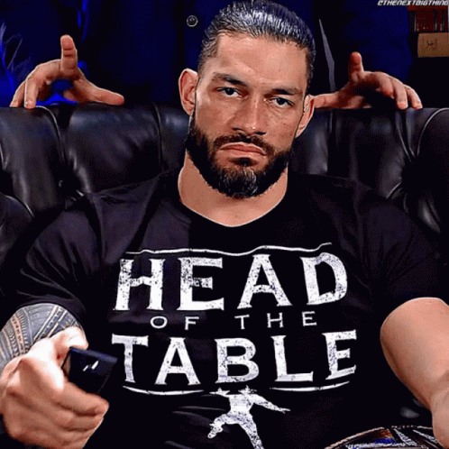 Roman Reigns Is Wearing A Head Of The Table T-Shirt GIF