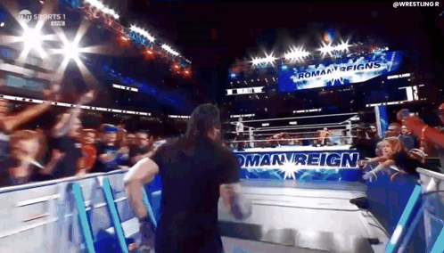 Roman Reigns Walking Out of Ring During Wrestling Match