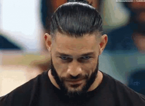 Roman Reigns With Beard And Bun GIF