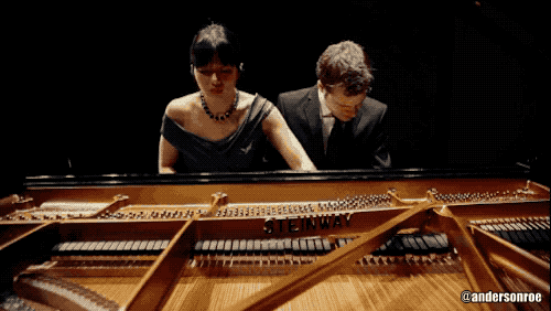 Romantic Couple Playing Piano GIF