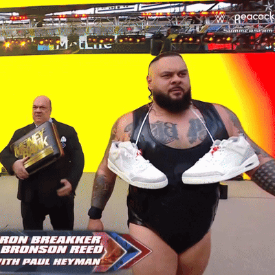 Ron Breakker Bronson Reed Holding Sneakers